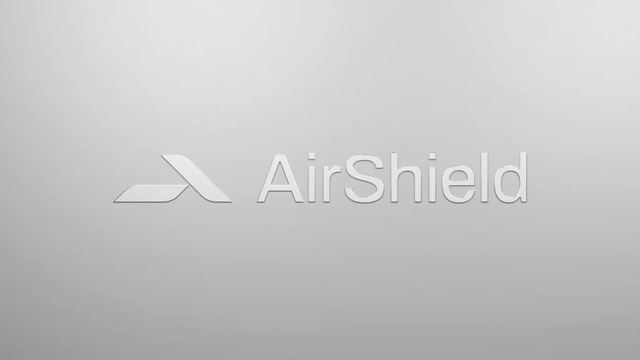 Znak AirShield, vtisnjen v kromirano površino, 3D render